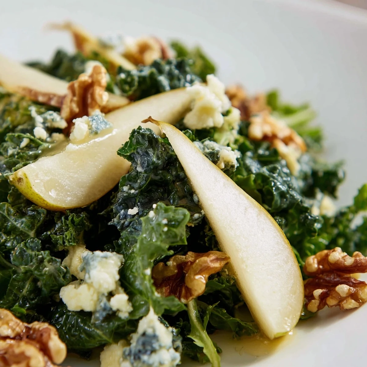 Winter Green Salad with Pears features toasted pecans and a tangy apple cider vinaigrette tossed with crisp greens.
