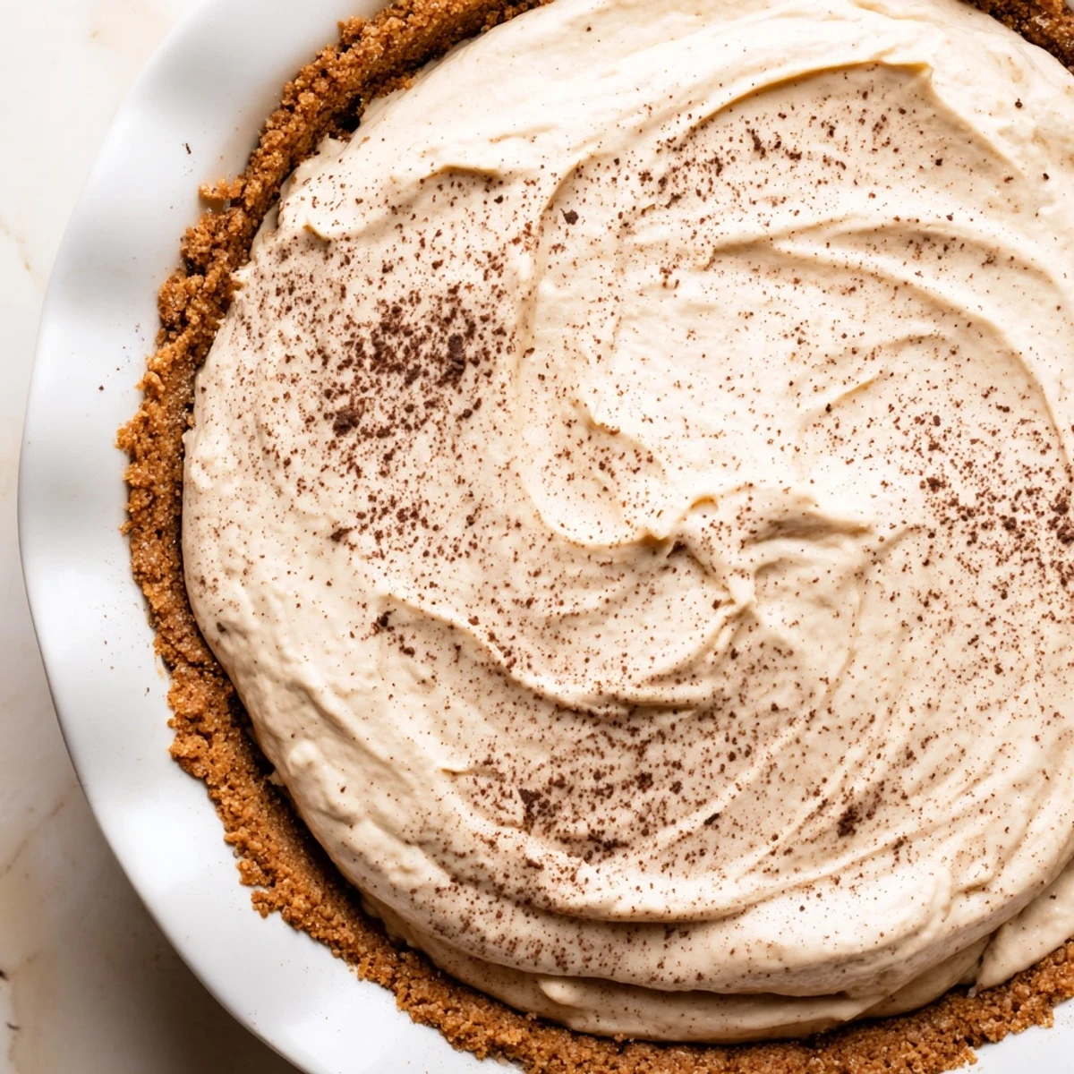 Chilled Keto Cold Brew Coffee Pie served on a white plate, perfect for a low-carb dessert treat.