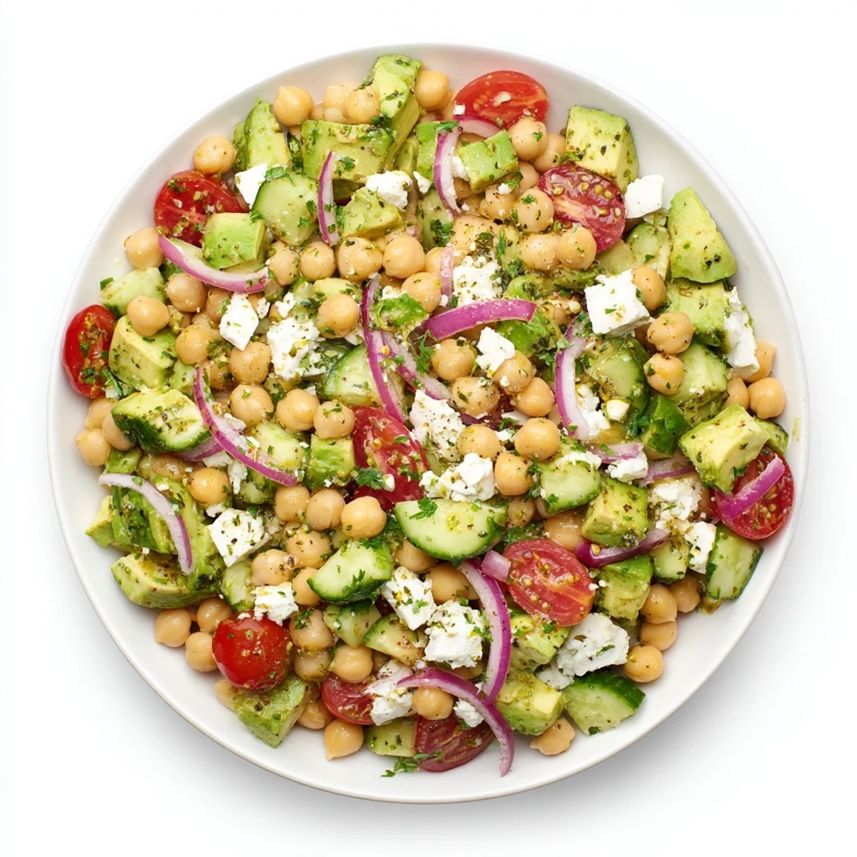 Creamy avocado chunks and tangy crumbled feta are tossed with chickpeas and cherry tomatoes in this Chickpea Feta Avocado Salad.