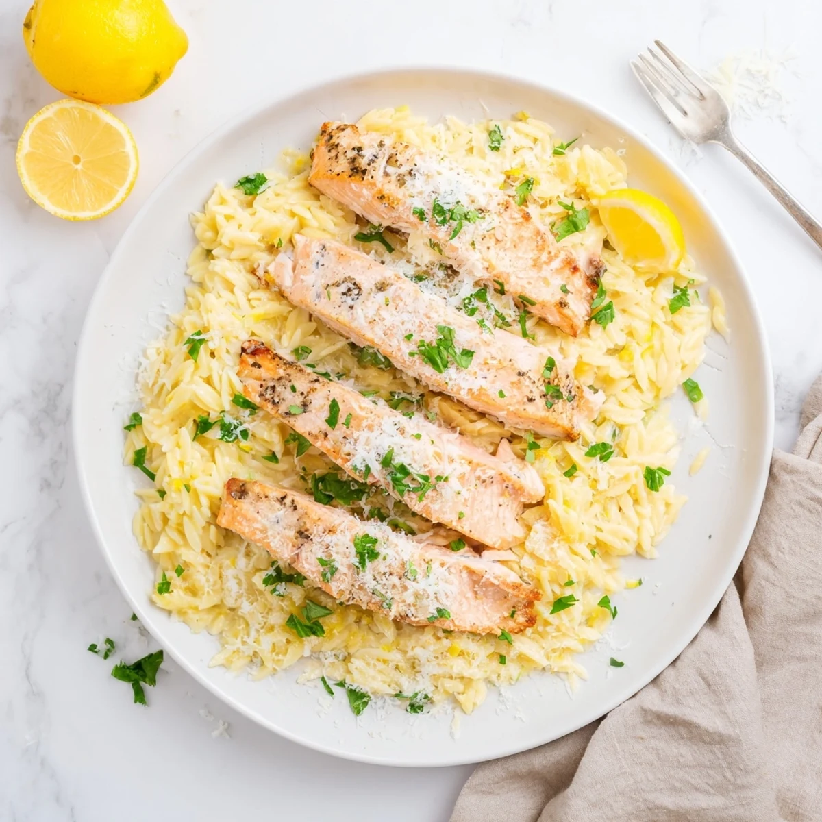One skillet salmon with lemon orzo featuring tender fish and bright citrus flavors