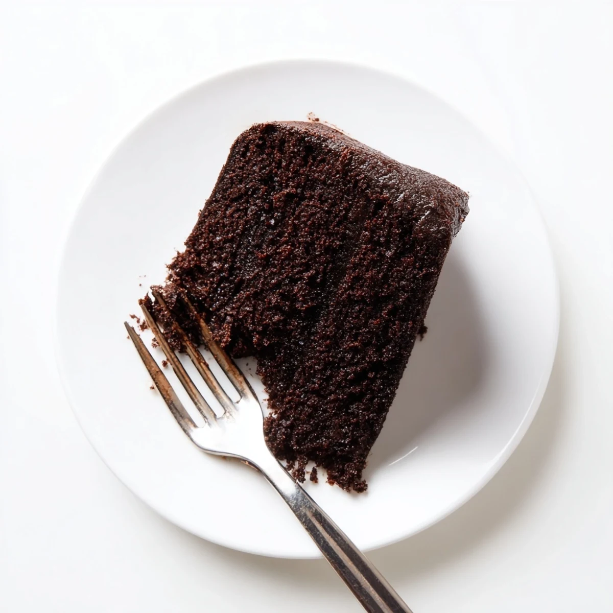 Rich chocolate mayonnaise cake with tender crumb topped with smooth chocolate frosting