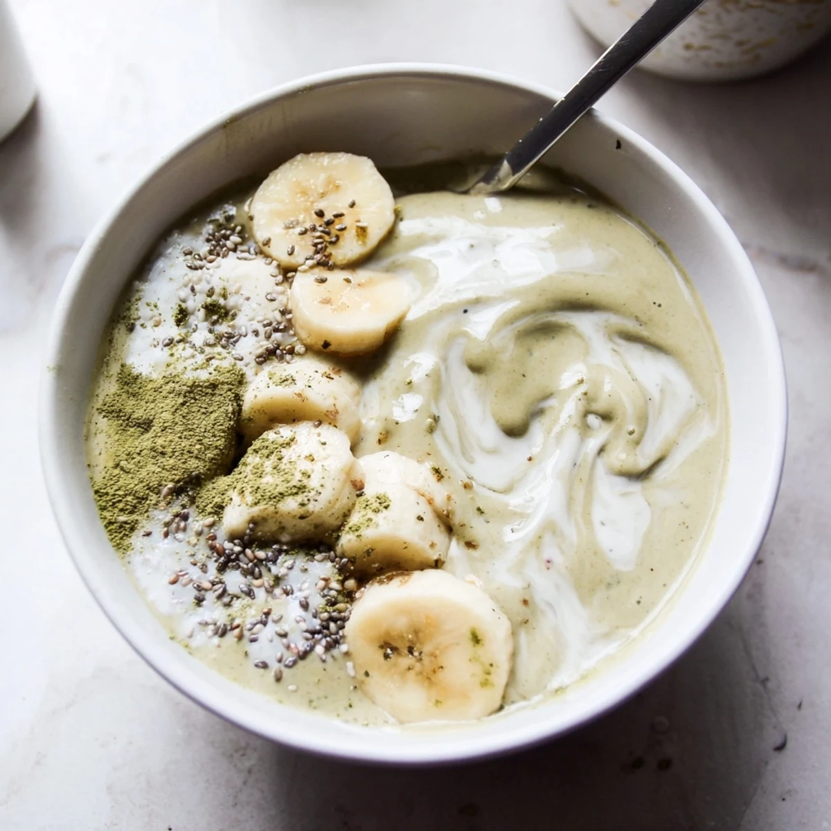 Chilled Matcha Smoothie frothy and bright, served with almond milk drizzle