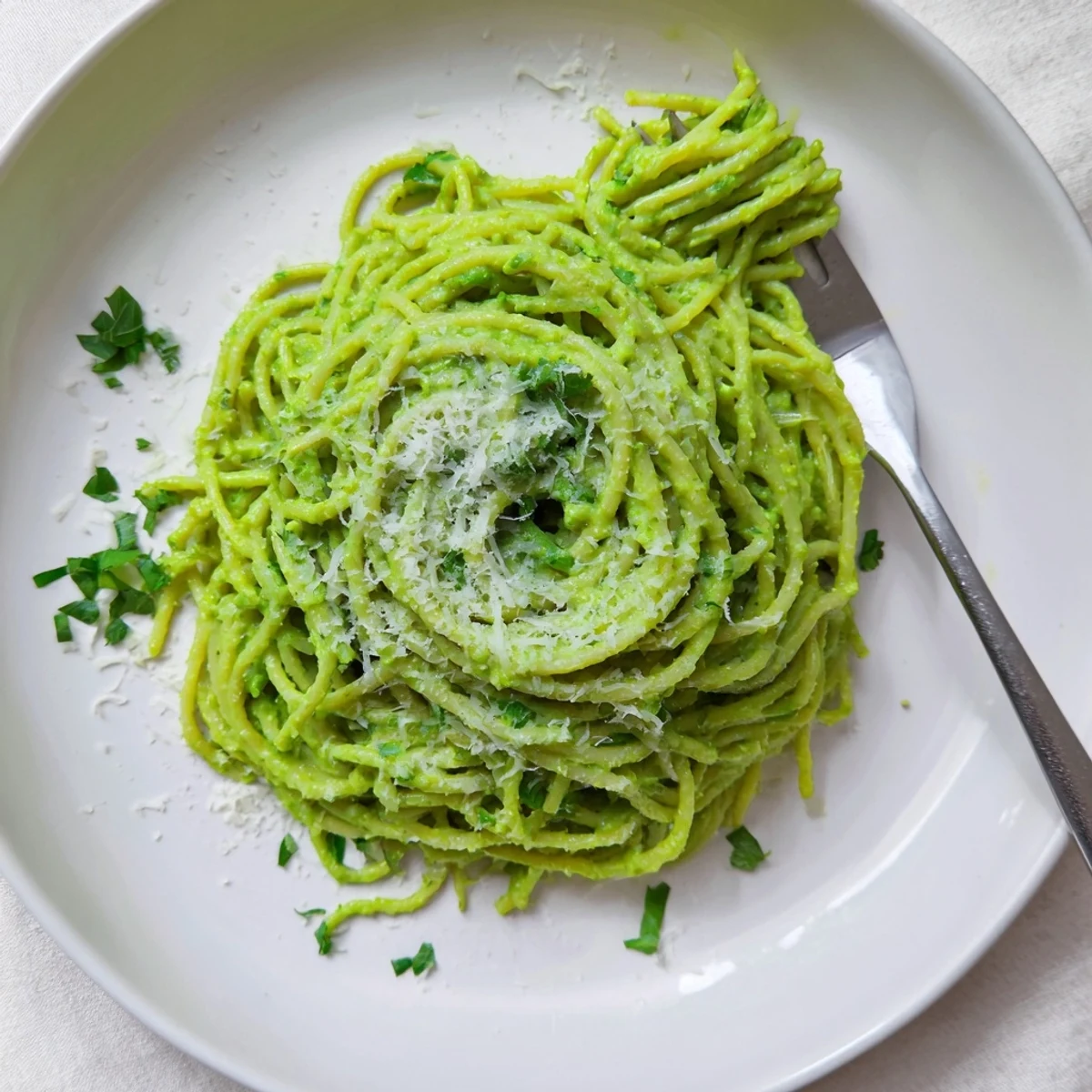 Creamy green goddess pasta sauce tossed with hot spaghetti and fresh herbs